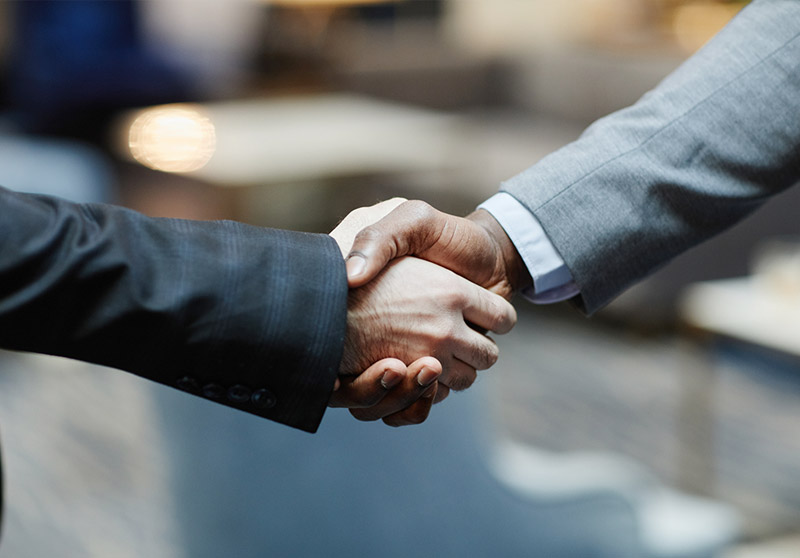 business people shaking hands